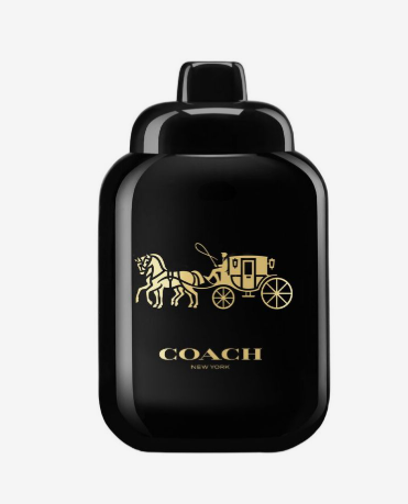 Coach New York black fragrance bottle with a gold horse-drawn carriage logo and 'COACH NEW YORK' text on a light gray background.