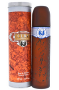 Cuba Original Eau de Toilette Natural Spray, 100 ml. The image shows the cylindrical amber-brown spray bottle next to its matching cardboard packaging cylinder, both featuring a textured orange-brown woodgrain pattern and a blue and white Fredericks de Paris label.