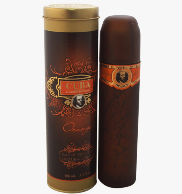 Cuba Orange Eau de Toilette set, featuring a cylindrical tin canister and a matching cigar-shaped bottle, both in dark brown with gold and orange accents.