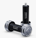 A black and silver Davidoff Champion perfume atomizer bottle displayed upright on top of a matching dumbbell against a clean white background.