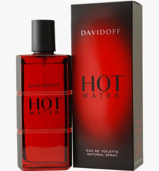 Davidoff Hot Water Eau de Toilette bottle and packaging box. The rectangular glass bottle contains a vibrant red liquid with a black cap, and it stands next to its matching red and black box on a light gray background.