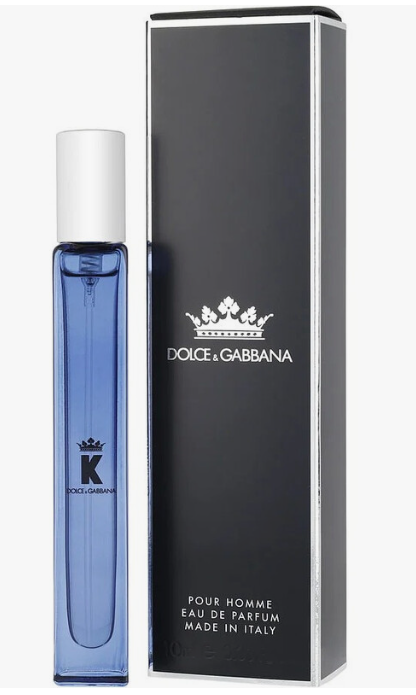 Dolce & Gabbana K Pour Homme Eau de Parfum bottle in blue glass next to its black packaging box with silver trim and white logo.