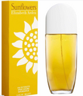 Elizabeth Arden Sunflowers Eau de Toilette bottle and packaging box. The box is bright yellow with a large white sunflower graphic and gold lettering.