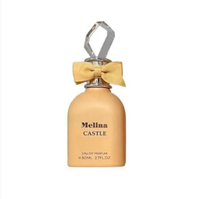 Melina Caster Eau de Parfum bottle in a warm peach-beige color, featuring a yellow bow and a faceted silver cap on a plain white background.