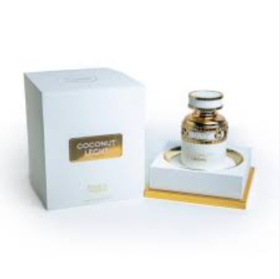 Perfume bottle and packaging with 'Coconut Leche' branding on a white background