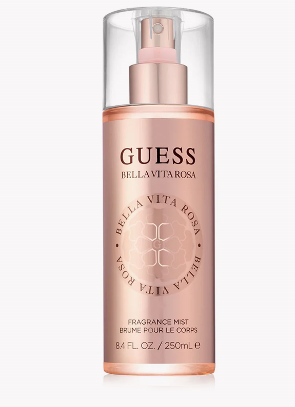 GUESS Bellavita Rosa Fragrance Mist in a 8.4 fl oz (250 mL) clear bottle with a metallic rose gold pump and a clear cap, on a light gray background.
