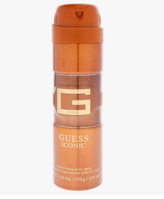 Guess Iconic Deodorant Body Spray in a metallic copper-orange aerosol can with a gold 'G' logo and white text, shown against a plain white background.