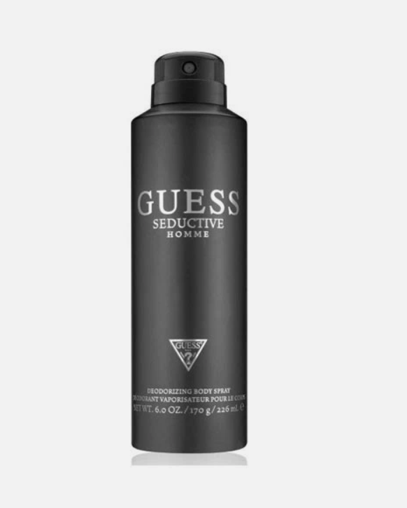 A matte black aerosol can of GUESS Seductive Homme Deodorizing Body Spray, featuring silver lettering and a black spray nozzle, set against a light gray background.