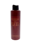 A bottle of Guess Red Deodorant Spray with a dark red body and a black cap, set against a plain white background.