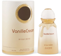 Vanille Cream Eau de Parfum bottle and its cylindrical cardboard packaging box by Gulf Orchid, both in a warm cream color with gold accents.