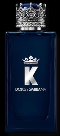 Dolce & Gabbana K perfume bottle in deep blue glass with a silver crown logo and a matching ornate silver cap on a black background.