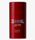 A red deodorant stick container with 'SCANDAL Jean Paul Gaultier' printed on the front, set against a plain light gray background.