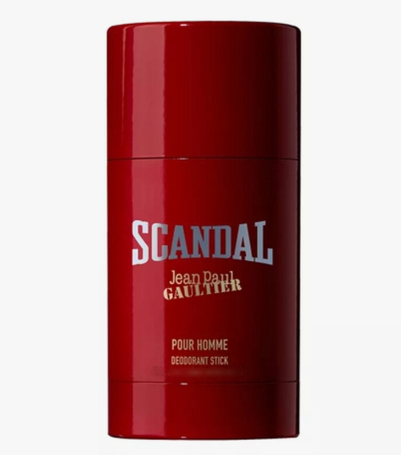 A red deodorant stick container with 'SCANDAL Jean Paul Gaultier' printed on the front, set against a plain light gray background.