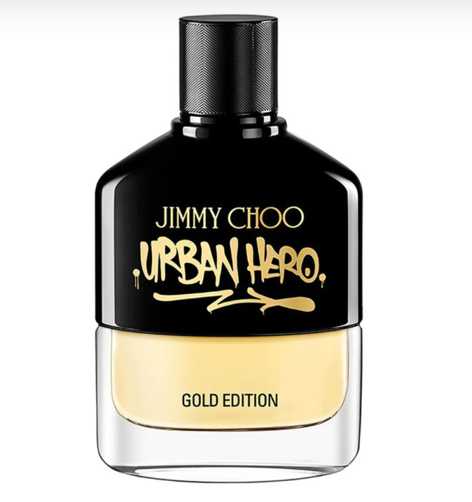 Jimmy Choo Urban Hero Gold Edition perfume bottle, featuring a glossy black upper bottle with gold lettering and a clear glass lower section containing a pale gold liquid, set against a plain white background.