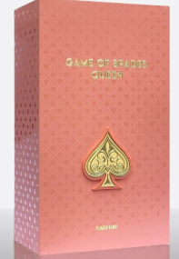 A pink card deck box with a gold spade emblem and the title 'Game of Cards' printed on the front, photographed against a plain white background.