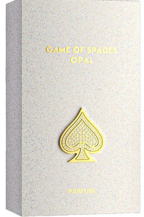 A rectangular perfume box in a light textured off-white finish with gold foil text reading 'GAME OF SPADES OPAL' and a large gold spade emblem on the front. The word 'PARFUM' appears near the bottom.