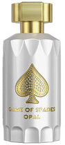 A close-up of a perfume bottle labeled 'Glace de Vivres Opal' featuring a faceted white glass body with a prominent gold spade emblem and a gold cap.
