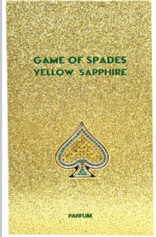 A square gold glitter card game box titled 'GAME OF SPADES YELLOW SAPPHIRE' with a large spade symbol in the center and the brand name 'PANUM' at the bottom.