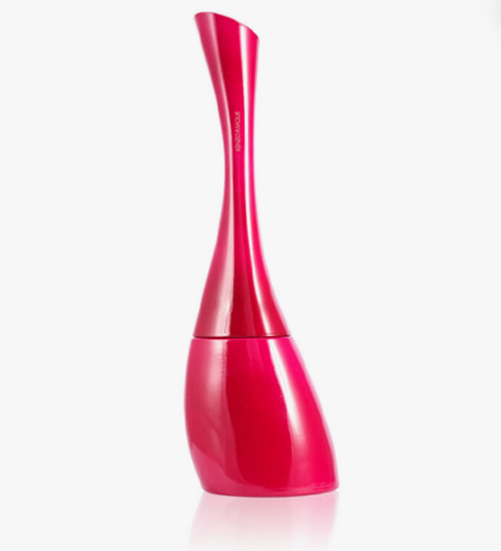 A glossy, vibrant magenta-pink wine decanter with a sculptural, curved silhouette, shown on a clean white background with a soft reflection underneath.