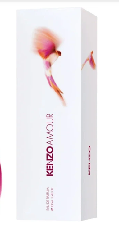 Kenzo Amour Eau de Parfum box, white packaging with a pink and orange abstract dancer illustration and vertical brand text.