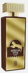 A rectangular bottle of African Style cologne with a textured gold cap and a gold-and-brown body, featuring a central label with a buffalo silhouette.