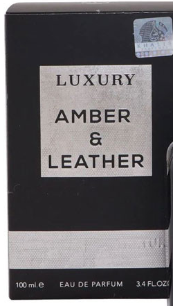Luxury Amber & Leather Eau de Parfum 100ml box, featuring a black background with a textured silver label and silver bottom band.
