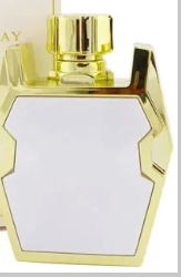 A close-up of a gold perfume bottle with a reflective white front panel, shown against a light background.