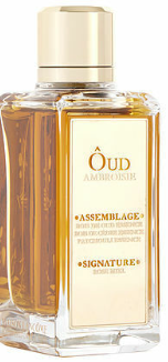 A bottle of Oud Amouroir fragrance with a gold cap and a cream-colored label, containing amber-colored liquid, set against a plain white background.