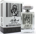 A bottle of Ash Al Tammar perfume with a matching box, both featuring a black and white striped design with a lion graphic.