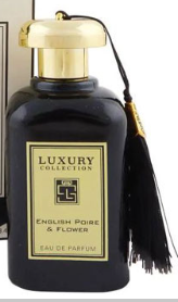 A close-up of a gold perfume bottle with a reflective white front panel, shown against a light background.
