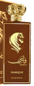 A close-up of a perfume bottle labeled Sharqiyat Paris, featuring a gold lion emblem on a dark brown background, with a matching crown-shaped cap and a matching box behind it.