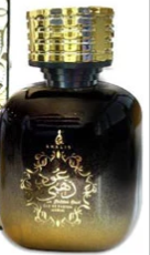 A dark amber glass bottle with a gold cap and gold decorative label, shown against a plain light background.