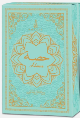 A turquoise and gold box for Hera perfume, featuring an ornate mandala design and Arabic calligraphy on the front.