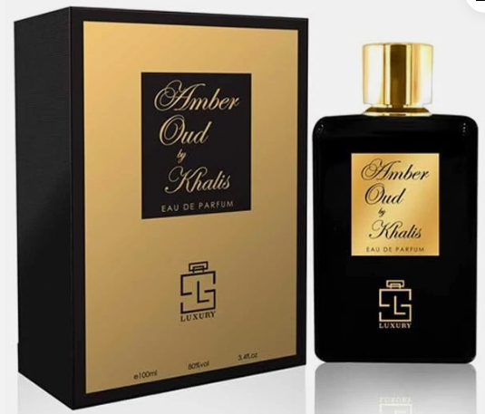 Amber Oud by Khalis Eau de Parfum bottle and its packaging box. The bottle is black with a shiny gold cap and a gold label, next to its black and gold box.
