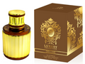 A luxury perfume bottle with a ribbed gold and amber-brown body next to its matching brown and gold box, labeled 'Luxury Collection Deluxe' on a white background.