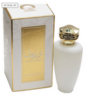 A bottle of Sharnivat Nourhani Eau de Parfum next to its white and gold packaging box, featuring a white bottle with a metallic gold cap and a gold label.