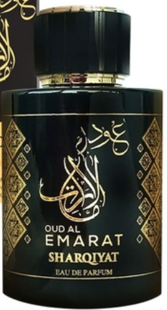 A bottle of Oud Al Emarat Sharqiyyat Eau de Parfum with a glossy black body, gold Arabic calligraphy, and a black cap with gold detailing, set against a dark background with a matching box partially visible.