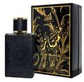 A bottle of Oud Mumtz perfume next to its black and gold presentation box, featuring Arabic calligraphy and gold floral designs.