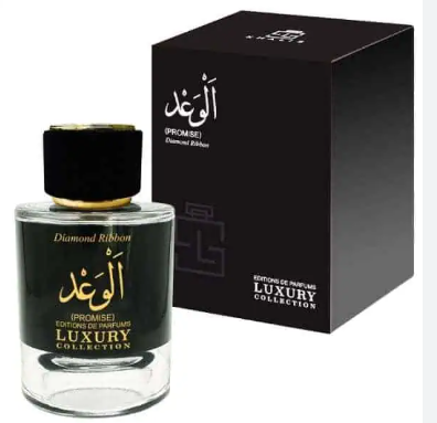 A bottle of luxury perfume with a black cap and black label, shown next to its black packaging box. The label and box feature gold and white text, including 'Diamond Ribbon', 'Promise', and 'Luxury Collection'.