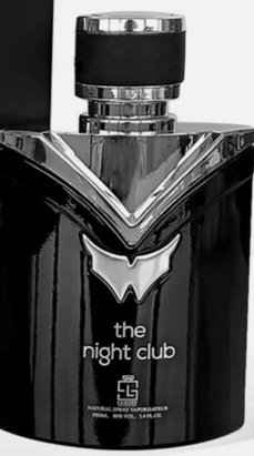 A close-up of a black and silver bottle of 'the night club' fragrance, featuring a glossy black body with a silver V-shaped emblem and a black cap.