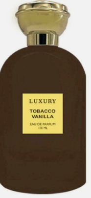 A dark brown perfume bottle with a gold cap and a gold label reading 'LUXURY TOBACCO VANILLA EAU DE PARFUM 100 ML'.