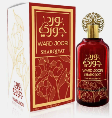 Ward Joori Sharqiyat Eau de Parfum bottle and its matching retail box. The bottle is a deep red glass with a gold ornate cap and gold Arabic calligraphy and floral patterns.