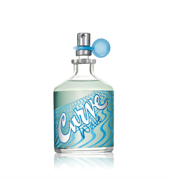 A bottle of Curve Water perfume with a clear glass body, light blue liquid, and a blue and white wavy label, featuring a silver spray nozzle with a blue rubber bulb, set against a plain white background with a soft reflection below.