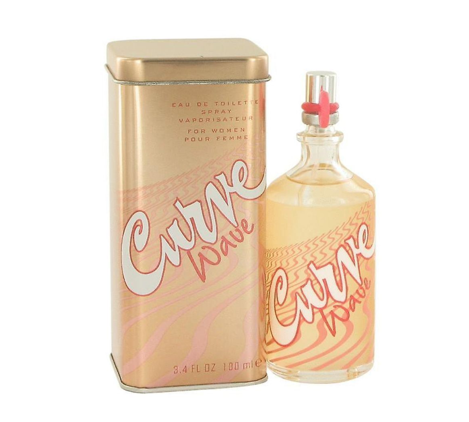 Curve Wave Eau de Toilette spray bottle and its metallic tin packaging, both in a warm peach-pink color with white and pink script lettering, on a white background.