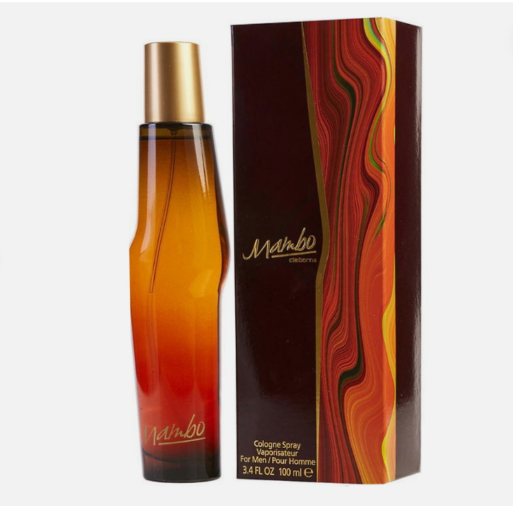 A bottle of Mambo cologne next to its retail box, featuring a glossy amber-to-red gradient glass bottle with a gold cap and a dark brown box with a vibrant red, orange, and yellow marbled pattern.