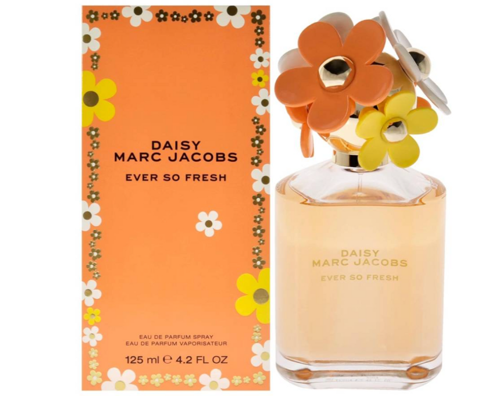 Daisy Marc Jacobs Ever So Fresh Eau de Parfum bottle with its orange floral box packaging, featuring a clear glass bottle with pale yellow liquid and a cap decorated with large orange and yellow flowers.