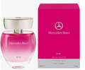 Mercedes-Benz Rose Eau de Toilette perfume bottle next to its bright pink packaging box, featuring the Mercedes-Benz logo and brand name.