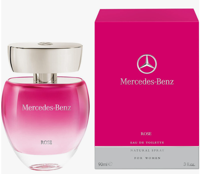 Mercedes-Benz Rose Eau de Toilette perfume bottle next to its bright pink packaging box, featuring the Mercedes-Benz logo and brand name.