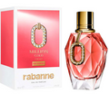 Rabanne Million Gold For Her Eau de Parfum bottle and its retail packaging box, featuring a faceted pink glass bottle with a gold cap and a rhinestone-embellished 'O' accent, next to its white and pink box.