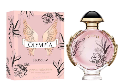 Olympéa Blossom perfume bottle and its pink floral packaging box by Paco Rabanne, featuring gold wing designs and botanical illustrations on a white background.